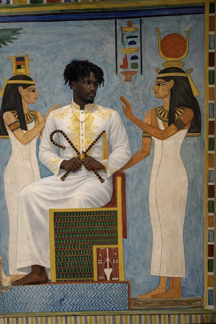 Painting in the style of an Egyptian tomb wall: the site owner in a white and gold robe seated on a throne holding a crook and flail, with Nephthys standing at the left and Hathor, crowned with the sun disc and horns, standing at the right.